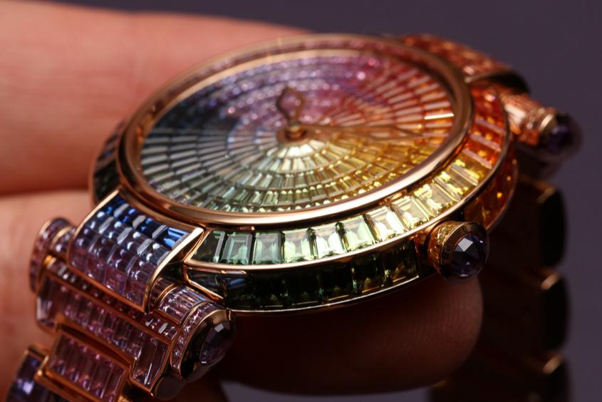 The luxury copy Chopard Imperiale Rainbow watches are made from 581 colorful sapphires.