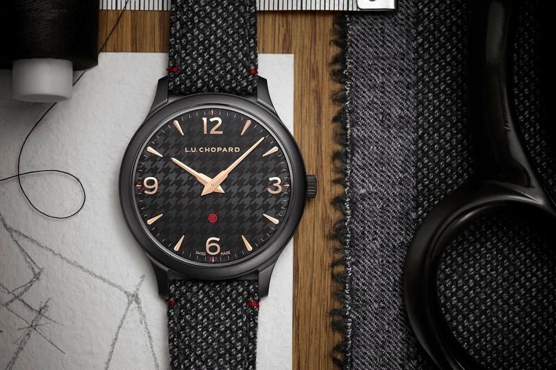 The male copy watch has dark grey strap.