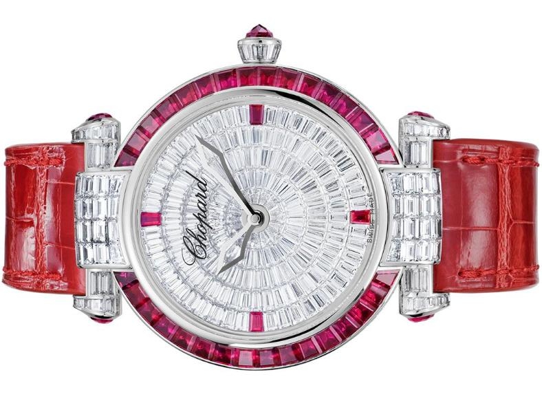 The 40mm fake watch us decorated with rubies and sapphires.
